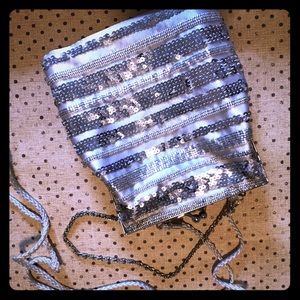Silver sequined purse.